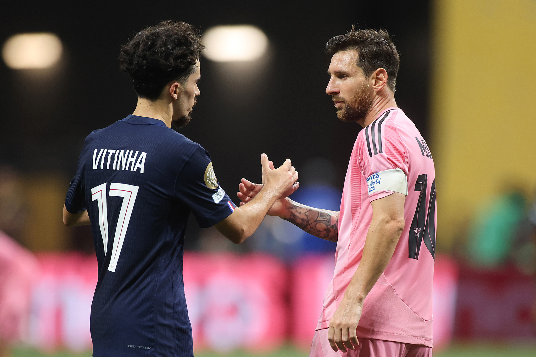 Vitinha and Lionel Messi