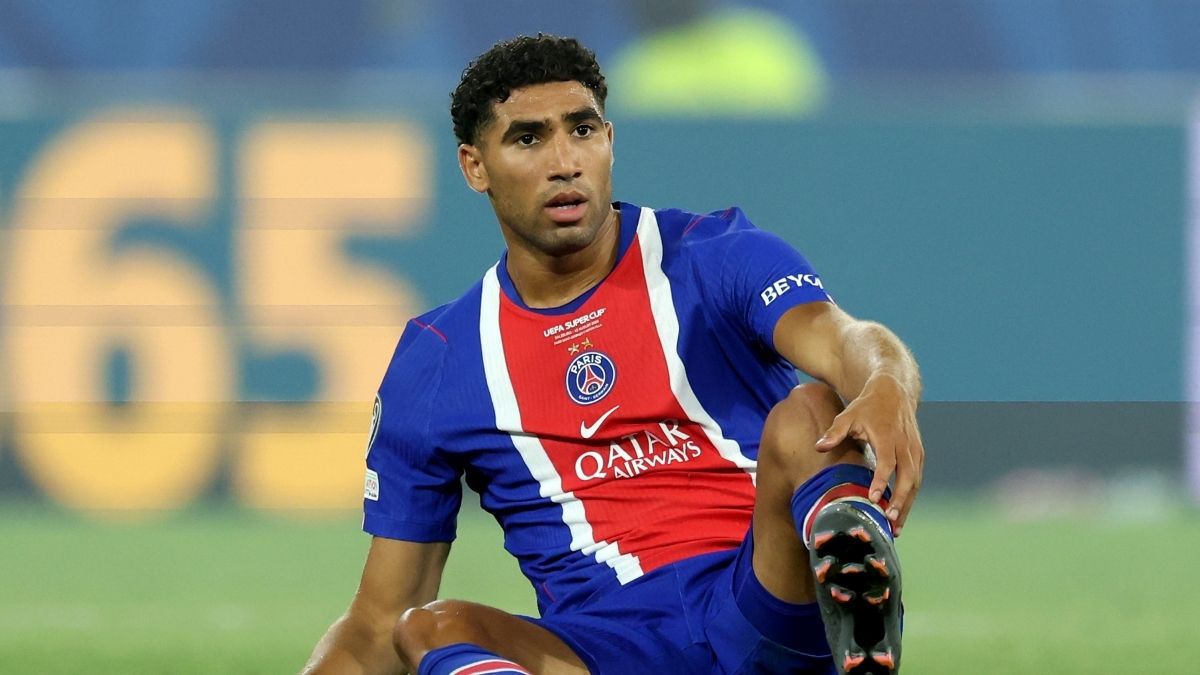 Achraf Hakimi injured on the pitch.